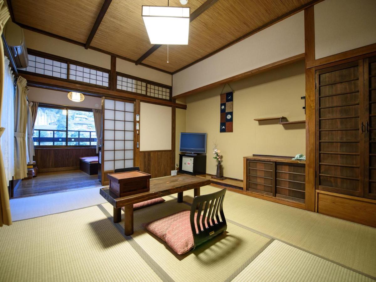 Yunohira Kamiyanagiya Hotel Yufu Buitenkant foto