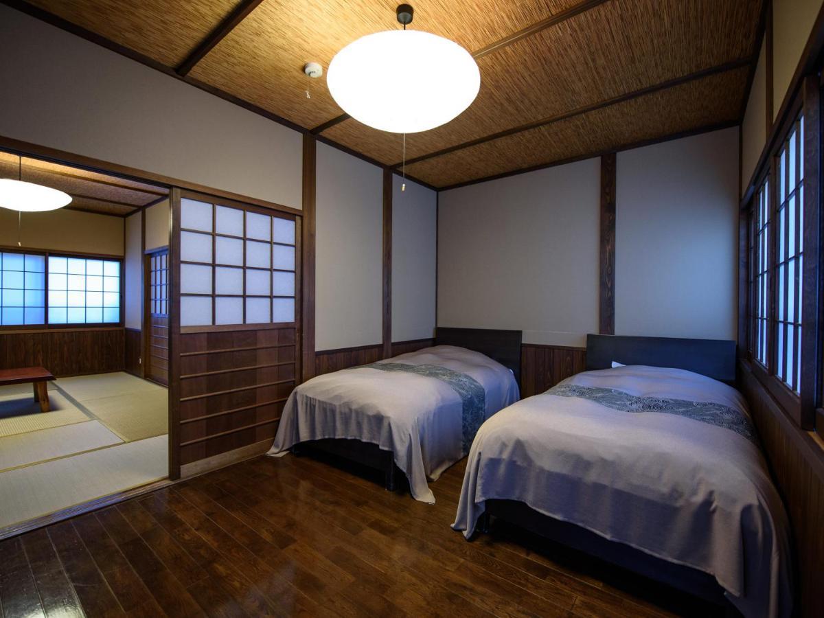 Yunohira Kamiyanagiya Hotel Yufu Buitenkant foto