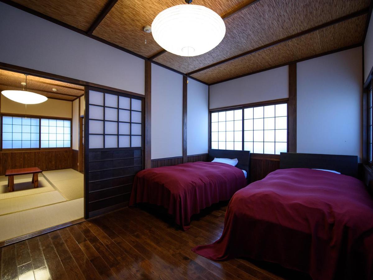 Yunohira Kamiyanagiya Hotel Yufu Buitenkant foto